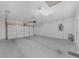 Spacious garage with an automatic door opener, ample room for parking, and storage at 6451 Crest Brook Way, Buford, GA 30518