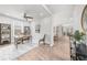 Stylish home office featuring a modern desk, shelves, and a large window for natural light at 6451 Crest Brook Way, Buford, GA 30518