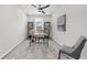 Cozy home office with modern desk, shelving, and a comfortable chair, perfect for remote work at 6451 Crest Brook Way, Buford, GA 30518