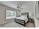 Bright bedroom with a ceiling fan and neutral tones at 5473 Blossomwood Sw Trl, Mableton, GA 30126
