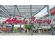 Entrance to Truist Park for the Atlanta Braves, showcasing the stadium's modern architecture and branding at 5473 Blossomwood Sw Trl, Mableton, GA 30126