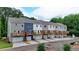 Aerial view of townhomes with garages and wooden decks at 5477 Blossomwood Sw Trl, Mableton, GA 30126