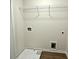 Inside laundry room with wire shelving and available hookups for washer and dryer at 5477 Blossomwood Sw Trl, Mableton, GA 30126