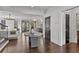 Spacious living room featuring hardwood flooring, stylish furnishings, modern decor, and abundant natural light at 620 Camp Ave, Roswell, GA 30075