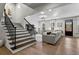 Open floor plan living room view from the staircase at 620 Camp Ave, Roswell, GA 30075