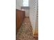 View of the backyard and side of the property showing the door to the backyard at 475 Lakeside Cir, Covington, GA 30016
