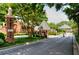 Gated community entrance with brick pillars at 5 Spring Green Pl, Atlanta, GA 30318