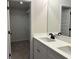 Stylish bathroom featuring double sinks, a spacious vanity, and modern finishes for a clean and elegant look at 5463 Blossomwood Sw Trl, Mableton, GA 30126