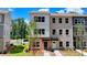 Beautiful townhome with a mix of brick and siding and a well-manicured lawn at 5463 Blossomwood Sw Trl, Mableton, GA 30126