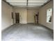 Spacious two-car garage with ample room for parking and storage, providing convenience and security for your vehicles at 5463 Blossomwood Sw Trl, Mableton, GA 30126