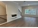 Living Room featuring a fireplace and lots of natural light at 5463 Blossomwood Sw Trl, Mableton, GA 30126