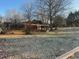 Fenced backyard featuring a shed and some mature trees at 1507 Smithfield Dr, Mcdonough, GA 30252