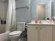 Neutral bathroom includes a shower/tub combo with a toilet and vanity at 1507 Smithfield Dr, Mcdonough, GA 30252