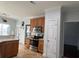 Well-equipped kitchen featuring granite countertops, stainless steel appliances, and tile flooring at 1507 Smithfield Dr, Mcdonough, GA 30252