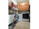 Functional laundry room with washer, dryer, and storage cabinets at 1507 Smithfield Dr, Mcdonough, GA 30252