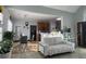 Bright, open living area with a dining table and a view into the kitchen at 1507 Smithfield Dr, Mcdonough, GA 30252