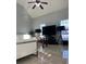 Comfortable living room with tiled floors, vaulted ceiling, and neutral tones at 1507 Smithfield Dr, Mcdonough, GA 30252