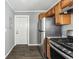 Kitchen featuring stainless steel appliances and wood cabinets at 1472 Norman Berry Dr, Atlanta, GA 30344