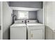 Laundry room with a washer and dryer and a window for ventilation at 1472 Norman Berry Dr, Atlanta, GA 30344