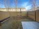 Fenced backyard with grass, patio, and mature trees offers privacy and space at 2693 Avanti Way, Decatur, GA 30035