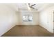 Spacious main bedroom with tray ceiling and ample natural light from the large window at 2693 Avanti Way, Decatur, GA 30035