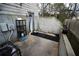 View of a small backyard area with a door, and concrete walls at 2726 Evans Mill Dr, Lithonia, GA 30058