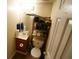 Small bathroom with a single sink vanity, toilet, and overhead lighting at 2726 Evans Mill Dr, Lithonia, GA 30058