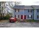 Charming townhouse with blue siding and red door, perfect for a cozy home at 2726 Evans Mill Dr, Lithonia, GA 30058