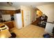 The kitchen has tile flooring, a refrigerator, a dishwasher, and a gas range at 2726 Evans Mill Dr, Lithonia, GA 30058