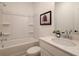 Clean bathroom featuring a tub-shower combination with a white single sink vanity at 1903 Deco Dr, Kennesaw, GA 30144