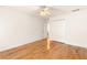 A serene bedroom boasts gleaming hardwood floors and ample closet space at 211 Congress Pkwy, Lawrenceville, GA 30044