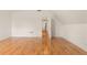 This bedroom features a spacious closet and gleaming hardwood floors at 211 Congress Pkwy, Lawrenceville, GA 30044