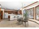 Eat-in kitchen with wood cabinets, breakfast bar and large windows providing natural light at 211 Congress Pkwy, Lawrenceville, GA 30044