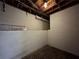Unfinished basement displaying the foundation, exposed utilities, and cement flooring at 5862 Kitchens Se Rd, Mableton, GA 30126