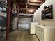Utility area in basement with washer, dryer, sink, and ample storage at 5862 Kitchens Se Rd, Mableton, GA 30126