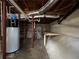 Unfinished basement area showing utilities and potential for customization at 5862 Kitchens Se Rd, Mableton, GA 30126