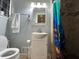 Bathroom with walk-in shower and modern fixtures at 5862 Kitchens Se Rd, Mableton, GA 30126