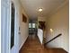 Inviting foyer featuring hardwood floors and staircase at 5862 Kitchens Se Rd, Mableton, GA 30126