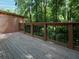 Wooden deck overlooking a lush green space; great for outdoor relaxation and entertaining at 742 Olde Towne Ln, Marietta, GA 30068