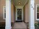 Elegant front door with classic architectural details and sidelights, creating a welcoming entrance at 742 Olde Towne Ln, Marietta, GA 30068