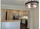 Open-concept kitchen with modern appliances, white cabinetry, and functional island for casual dining at 742 Olde Towne Ln, Marietta, GA 30068
