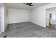 Spacious living room with neutral tones, ceiling fan, and ample natural light at 742 Olde Towne Ln, Marietta, GA 30068