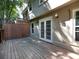 Wooden patio area with lighting ideal for entertaining or enjoying quiet evenings at 742 Olde Towne Ln, Marietta, GA 30068