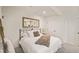 Comfortable main bedroom featuring a bed with white linens and a decorative throw at 10594 Serenbe Ln, Chattahoochee Hills, GA 30268