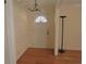 Bright entryway featuring hardwood floors and a classic chandelier at 575 Midland Park Dr, Stone Mountain, GA 30087