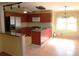 Functional kitchen with stainless steel appliances and tiled flooring at 575 Midland Park Dr, Stone Mountain, GA 30087