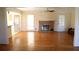Spacious living room showcasing a brick fireplace and bright, airy atmosphere at 575 Midland Park Dr, Stone Mountain, GA 30087