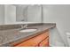 This bathroom features a granite-look counter on a wooden vanity at 3183 Abbeywood Dr, Decatur, GA 30034