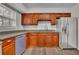 Features the kitchen's stainless steel appliances, ample counter space and beautiful cabinetry at 3183 Abbeywood Dr, Decatur, GA 30034