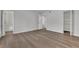 This main bedroom features wood flooring, an ensuite bath and an open closet at 3183 Abbeywood Dr, Decatur, GA 30034